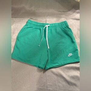 Men’s Nike Teal Athletic Shorts (would fit a women’s large)